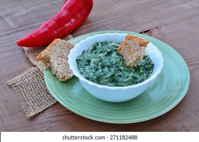 Homemade Spinach Dip.Creamed Spinach In White Bowl.