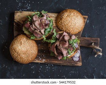 Homemade Steak Burger On Wooden Cutting Board, Top View