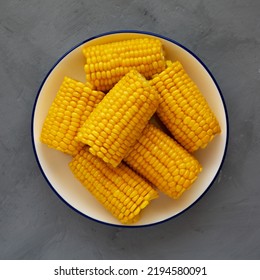 Homemade Steamed Corn On The Cob With Butter On A Plate, Top View. Flat Lay, Overhead, From Above.