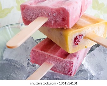 Home-made Strawberry and Mango Popsicles