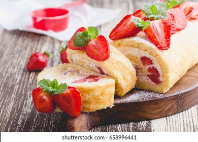 Homemade Strawberry Shortcake Cake Roll With Cream Cheese Whipped Cream, Perfect Summer Season Dessert Served On Rustic Wooden Board