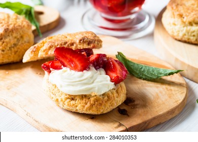 Homemade strawberry shortcake with vanilla whipped cream and berry compote