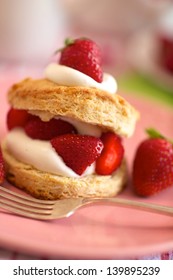 Homemade strawberry shortcake with whipped cream, selective focus, vertical