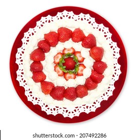 Homemade Strawberry Whipped Cream Cake Displayed On A Red Plate, Top View, Isolated On White