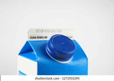  Homemade studio photo for focusing on seal in milk box with expire date info. 