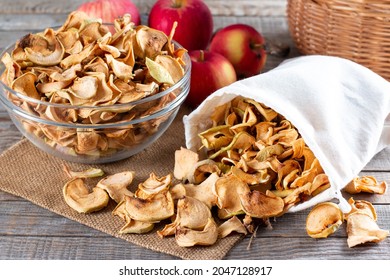 Homemade Sun-dried Organic Apple Slices, Crispy Apple Chips, On An Old Rustic Wooden Table With Fresh Apple. Healthy Eating. Vitamins.