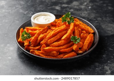 Homemade sweet potato fries with mayo, homemade roasted in the air fryer - Powered by Shutterstock