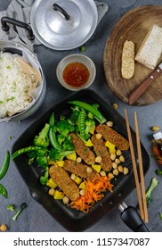 Homemade Thai Vegetarian Cuisine / Thai Sweet Chili Tempeh Buddha-Bowl Bento / Delicious And Healthy Meal For Light Eater And Weight Watcher For A Clean Living Lifestyle