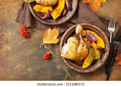 Homemade Thanksgiving Dinner Ripe Pumpkin And Thanksgiving Turkey On A Dark Wooden Table. View From Above. Copy Space.