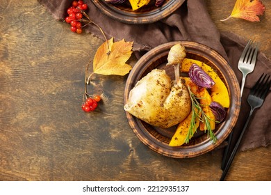 Homemade Thanksgiving Dinner Ripe Pumpkin And Thanksgiving Turkey On A Dark Wooden Table. View From Above. Copy Space.