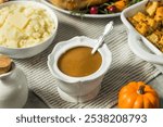 Homemade Thanksgiving Turkey Gravy in a Bowl for Potatoes