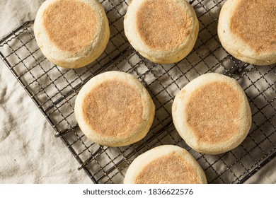 Homemade Toasted English Muffins with a Tab of Butter - Powered by Shutterstock