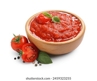 Homemade tomato sauce in bowl and fresh ingredients isolated on white