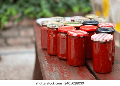 Homemade Tomato Sauce in Glass Jars ready for Winter House - Powered by Shutterstock