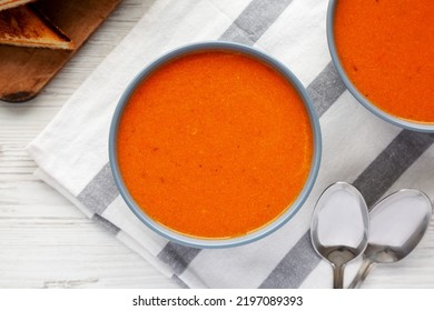 Homemade Tomato Soup With Grilled Cheese On A White Wooden Background, Top View. Flat Lay, Overhead, From Above. 