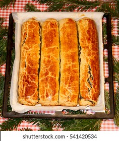 Homemade Traditional Poppy Seed And Walnut Rolls For Christmas Holiday. Tradition Hungarian Christmas Cake Name Is Beigli Or Bejgli. My Mother's Beautiful Christmas Cake With Her Own Hands
