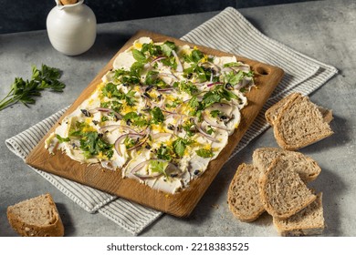 Homemade Trendy Butter Board with Herbs and Bread - Shutterstock ID 2218383525