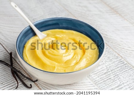 Homemade vanilla pastry cream or custard cream. Cooked with milk, egg yolks and sugar,  thickened with corn starch.