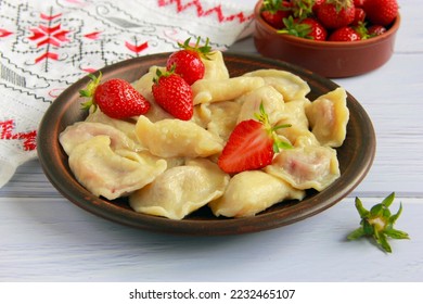 Homemade varenyky with strawberry filling - traditional ukrainian dish