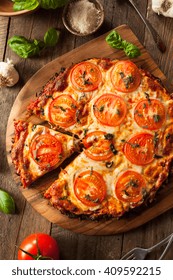 Homemade Vegan Cauliflower Crust Pizza With Tomato And Basil