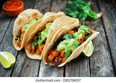 Homemade Vegan Tacos With Black Beans, Sweet Potato And Guacamole And Tortillas Flatbread. Clean Eating, Plant Based Food Concept