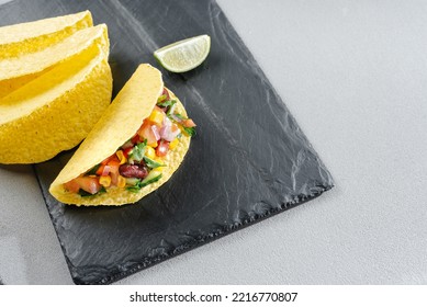 Homemade Vegan Tacos With Black Beans, Sweet Potato And Guacamole And Tortillas Flatbread. Clean Eating, Plant Based Food Concept. Top View.