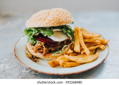 Homemade Veggie Burger And Fries Made Without Oil On A Metal Plate 