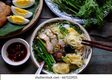 Homemade Vietnam Food, Egg Noodle Soup With Wontons, Colorful Food Ingredient For This Eating As Egg, Pork, Broth, Shallot, Bean Sprout, Agaric, Vegetable