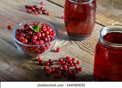 Homemade Vitamin Drink. Cranberry Juice And Fresh Cranberries On The Table
