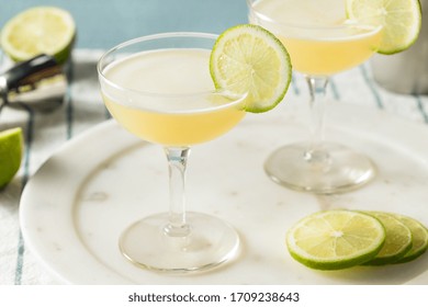 Homemade Vokda Gimlet Cocktail in a Coupe Glass