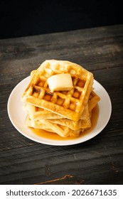 Homemade Waffle Stack With Butter And Honey Or Maple Syrup