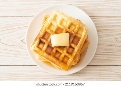 Homemade Waffle Stack With Butter And Honey Or Maple Syrup