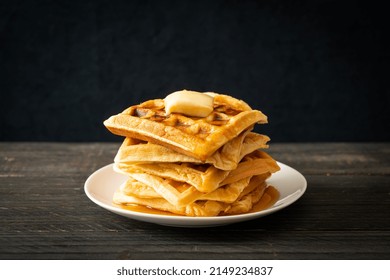 Homemade Waffle Stack With Butter And Honey Or Maple Syrup