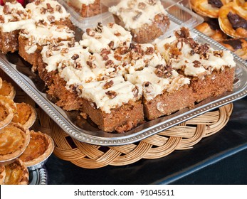 Homemade walnut carrot cake on display at the market