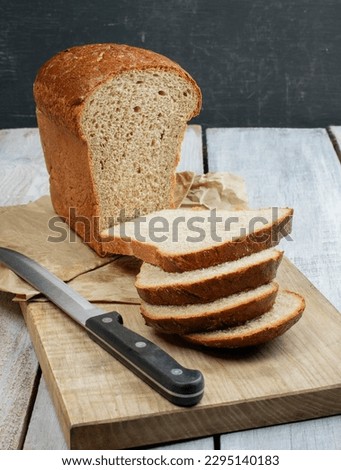 Homemade whole grain bread. loaf or sliced bread. Tasty and delicious bread fresh and healthy food meal lunch dinner breakfast , flour snacks sandwich bread.