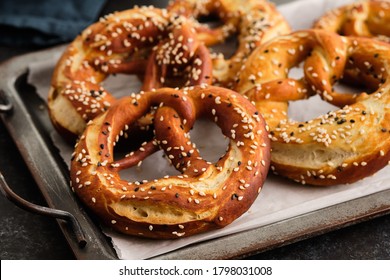 Homemade whole meal pretzels with sesame and salt. Oktoberfest.