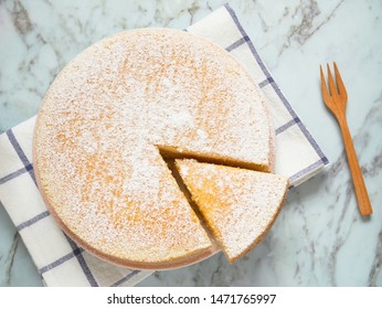 Homemade Yogurt Cake With Icing Sugar. Close Up. Top View.