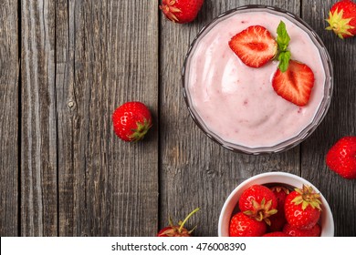 Homemade Yogurt With Fresh Strawberry On A Wooden Background, Top View.