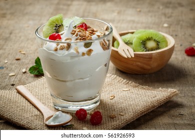 Homemade Yogurt With Granola, Kiwi, Dried Fruit And Nuts Bio With Most Healthy Seed.