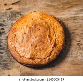 Homemade Yogurt Sponge Cake On A Wooden Base  