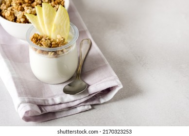 Homemade Yougurt With Granola Decorated With Apple Healthy Diet Breakfast Napkin Spoon Gray Background Horizontal