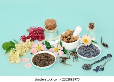 Homeopathic Preparation Of Alternative Herbal Plant Medicine. Valerian Root, Lavender, Elder Flower, Wild Rose And Ginseng. Natural Healing Calming Anxiety Reducing Remedies. On Blue Background.
