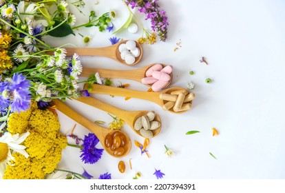 Homeopathy and dietary supplements from medicinal herbs. Selective focus. Nature. - Shutterstock ID 2207394391