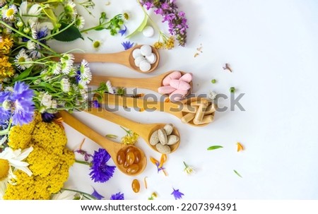 Homeopathy and dietary supplements from medicinal herbs. Selective focus. Nature.