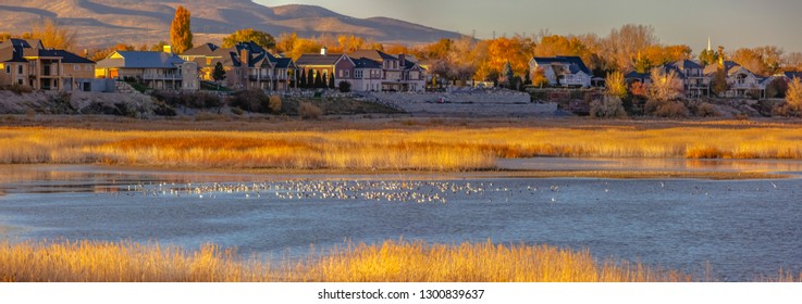 Homes And Lake Against Mountain In Utah Valley