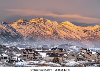 Homes In Utah Valley With View Of Magnificent Wasatch Mountains At Sunset