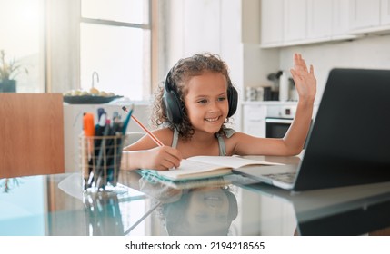 Homeschool, Education And Video Call Distance Learning For Child On Laptop In Home Living Room. Smile, Writing And Happy Girl Or Waving Student Greeting On Online School And Study Class For Homework