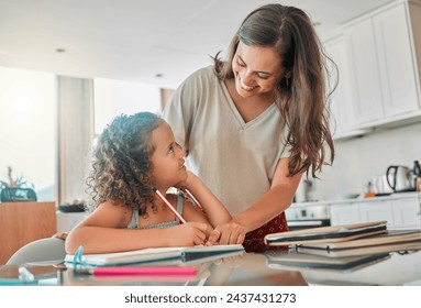 Homeschool, learning and bonding with a mother and daughter doing homework in the kitchen at home. Happy parent helping her child with a school task, smiling, talking and enjoying time together - Powered by Shutterstock