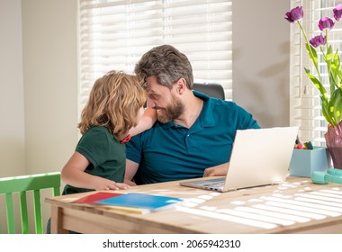 homeschooling and elearning. back to school. happy father and son use communication technology