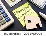 Homestead exemption written on the sticker and model of home.